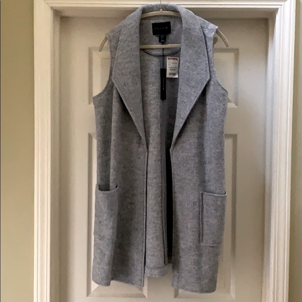 Long sleeveless jacket